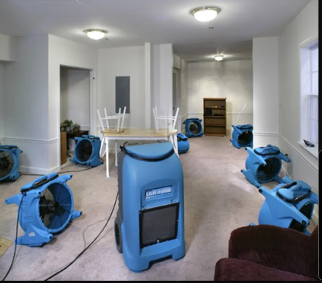 Air movers and dehumidifier setup for Water Damage Restoration in North Stonington